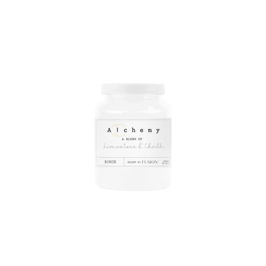 White bag labeled 'Alchemy' with text on a white background