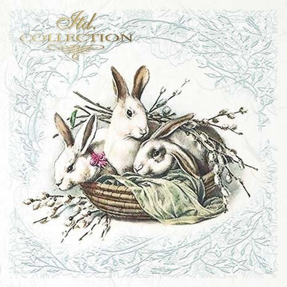 Three rabbits in a basket with branches and leaves on a textured background