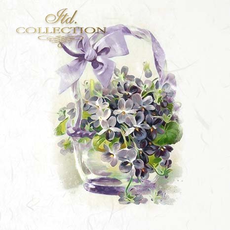 Decorative arrangement of flowers in a glass vase with a purple ribbon on a light background.