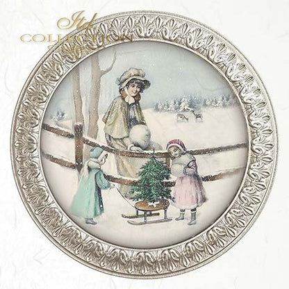 Decorative frame with a winter scene of people around a tree, framed by ornate detailing.