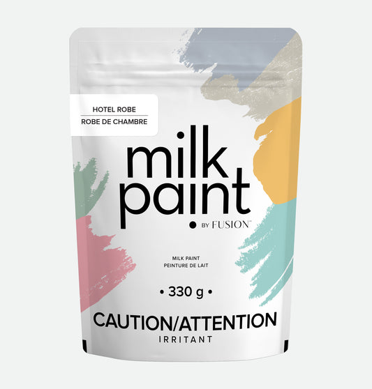 Package of milk paint by Fusion with colorful abstract designs on a white background